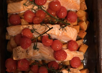 Roasted salmon with sweet potatoes & tomatoes